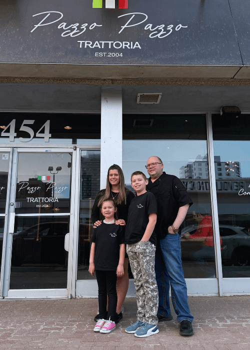 Pazzo Pazzo Trattoria family owners and staff welcoming guests in Edmonton